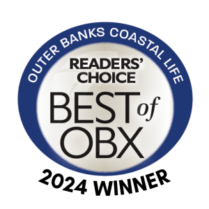 A blue and white logo for the outer banks coastal life magazine.